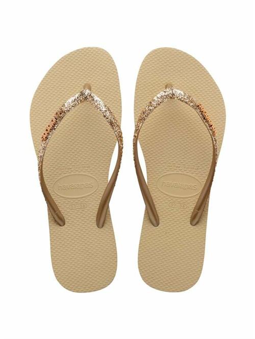 Se Havaianas Hav. Slim Glitter II Kvinde Sand/goldenlightmeta Klipklapper Str 41/42 - hos Magasin ved Magasin