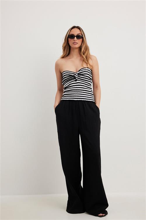 Se NA-KD Structured Flowy Elastic Waist Pants Kvinde Black Bukser Med Brede Ben Str EU 36 - hos Magasin ved Magasin