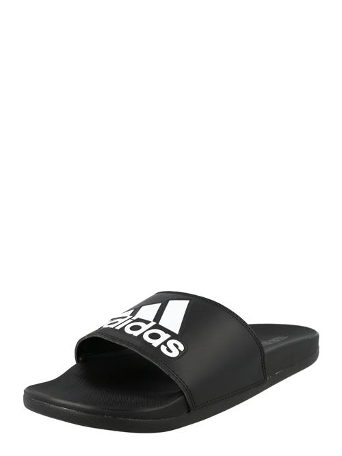 Se ADIDAS SPORTSWEAR Strand-/badesko 'Adilette'  sort / hvid ved About You