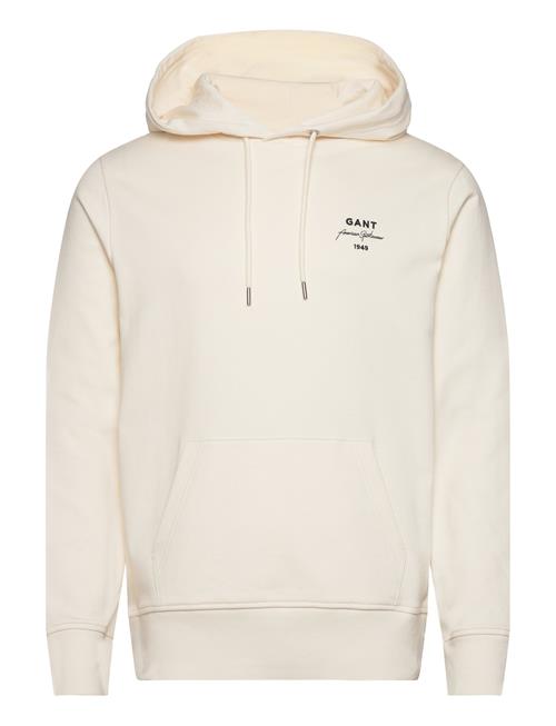 Se GANT Logo Script Hoodie GANT Cream ved Booztlet