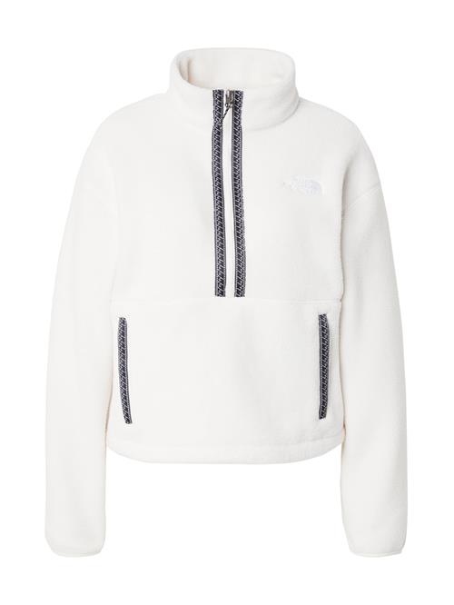 Se THE NORTH FACE Pullover 'FLEESKI'  sort / hvid / offwhite ved About You