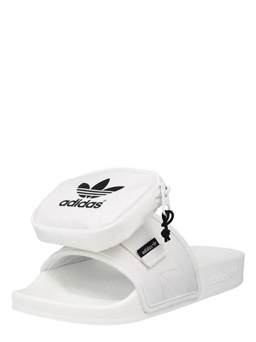 Se ADIDAS ORIGINALS Pantoletter 'POUCHYLETTE W'  sort / hvid ved About You