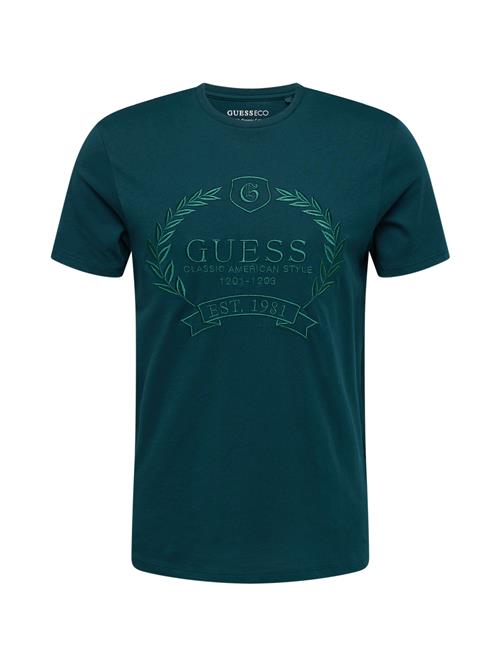 Se GUESS Bluser & t-shirts 'CLASSIC'  smaragd / mørkegrøn ved About You