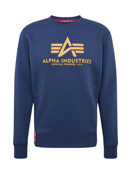 Se ALPHA INDUSTRIES Sweatshirt  navy / guld ved About You