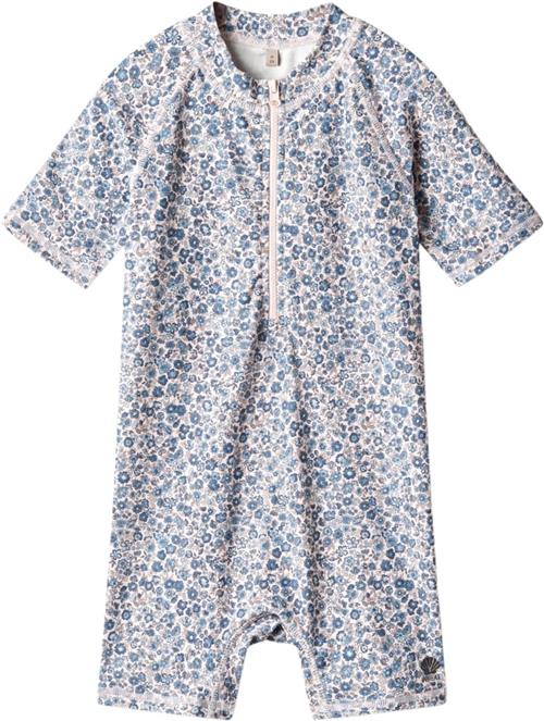 Wheat Bade Heldragt Cas Str 110 / 5 år - Blue Flower Meadow Uv Tøj & Hatte Polyester hos Magasin