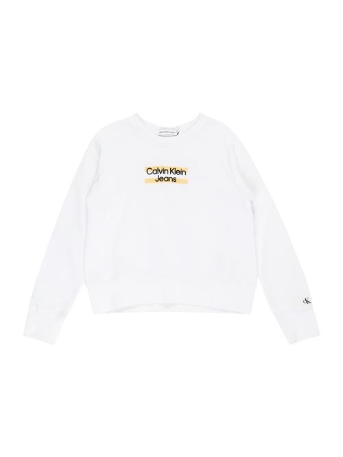 Se Calvin Klein Jeans Sweatshirt 'Hero'  abrikos / sort / hvid ved About You