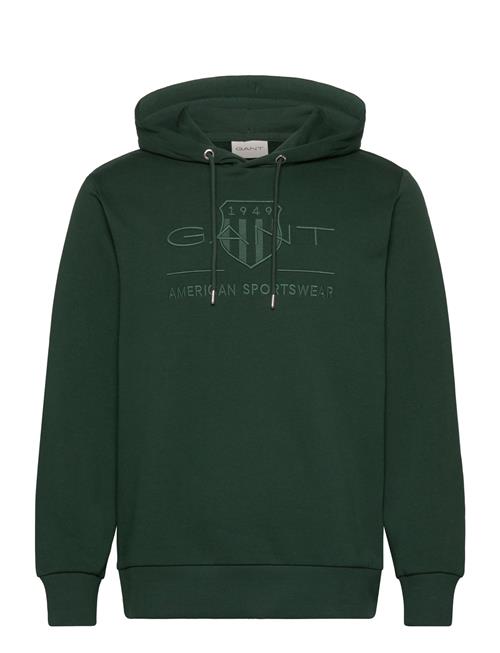 Se GANT Reg Tonal Shield Hoodie GANT Green ved Booztlet