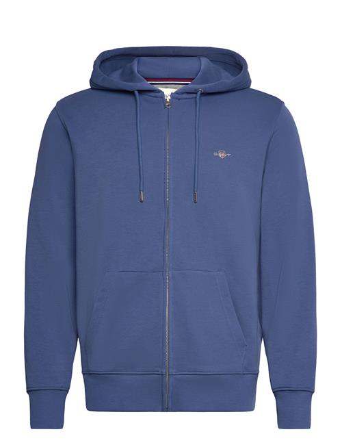 Se GANT Reg Shield Full Zip Hoodie GANT Blue ved Booztlet