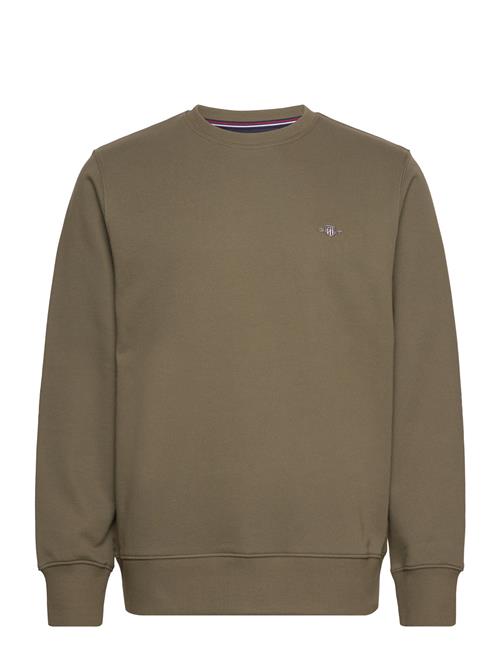 Se GANT Reg Shield C-Neck Sweat GANT Khaki ved Booztlet