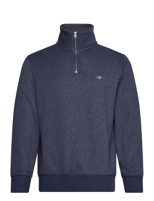 Se GANT Reg Shield Half Zip Sweat GANT Blue ved Booztlet