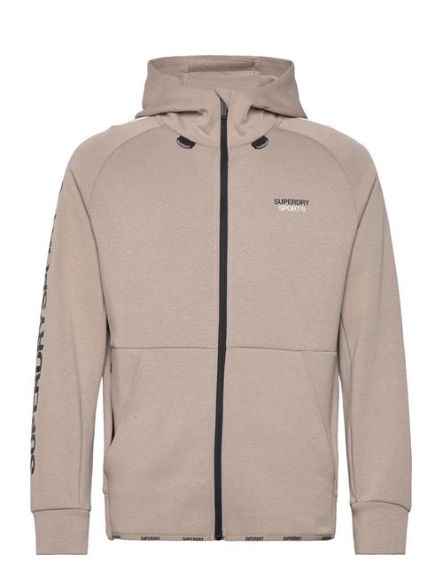 Se Superdry Sport Sport Tech Logo Loose Zip Hood Superdry Sport Beige ved Booztlet