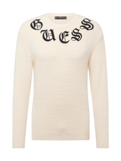 Se GUESS Pullover  chamois / sort ved About You