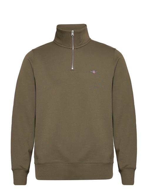 Se Reg Shield Half Zip Sweat GANT Green ved Booztlet