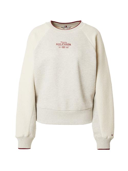 Se TOMMY HILFIGER Sweatshirt 'REG'  creme / hvid ved About You