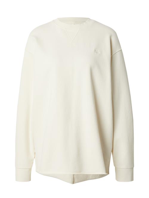 Se Superdry Sweatshirt 'STUDIOS'  offwhite ved About You