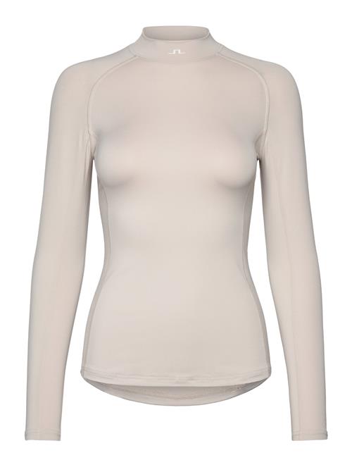 Se Asa Soft Compression Top J. Lindeberg Beige ved Booztlet