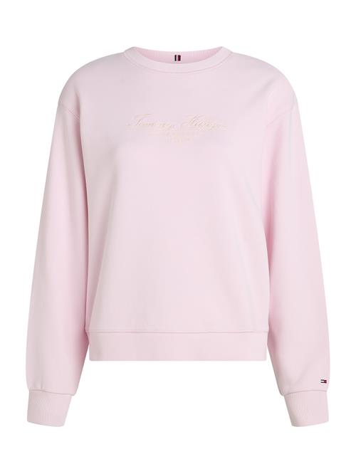 Se TOMMY HILFIGER Sweatshirt  lysebeige / lyserød ved About You