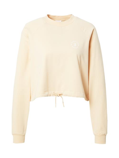 Se ABOUT YOU x GNTM Sweatshirt 'Xenia'  creme ved About You