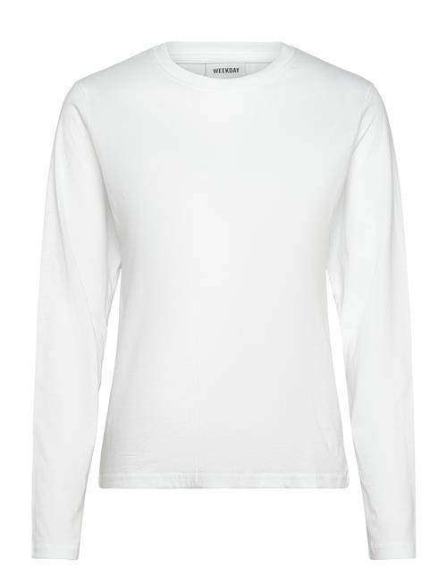 Se Essence Standard Long Sleeve Weekday White ved Booztlet