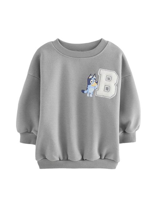 Se Next Sweatshirt 'Bluey'  lyseblå / mørkeblå / gul / grå / hvid ved About You