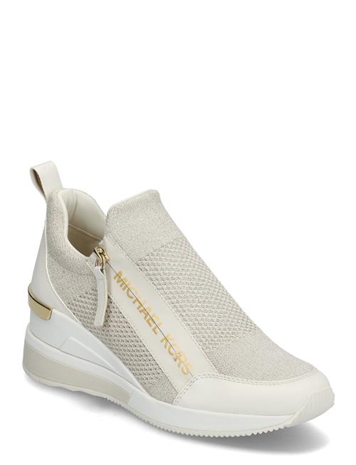 Se Willis Wedge Trainer Michael Kors Cream ved Booztlet