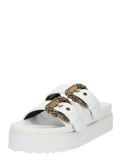 Se Versace Jeans Couture Pantoletter 'FONDO ARIZONA'  hvid ved About You