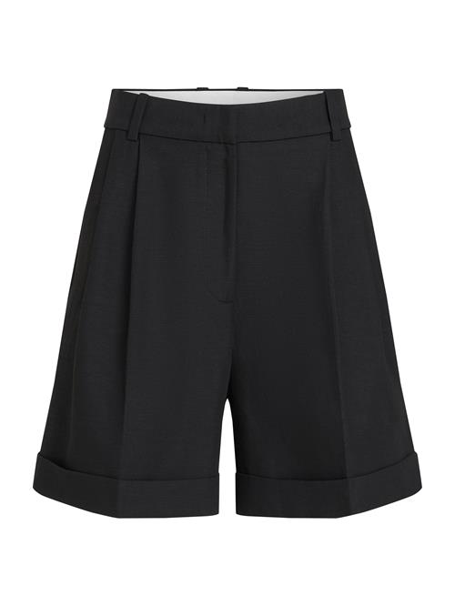 TOMMY HILFIGER Lærredsbukser  sort