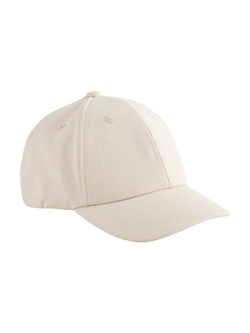 Next Hue  creme