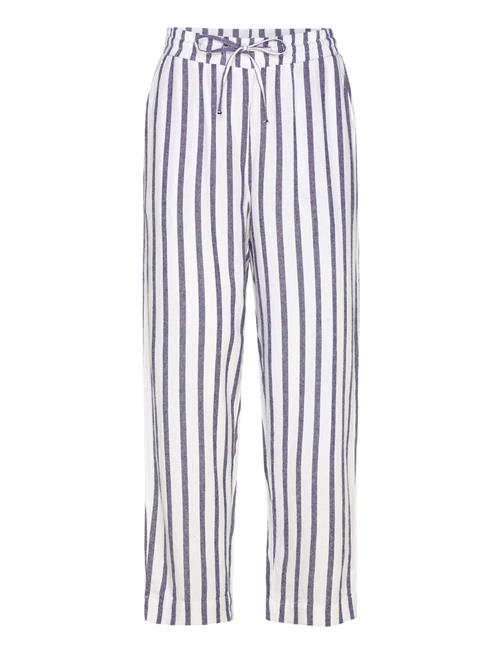 Pants From Freequent In A Light Material With A Striped Print. The Pants Have A FREE/QUENT Patterned