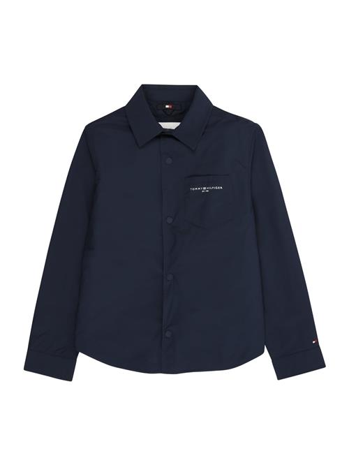 Se TOMMY HILFIGER Overgangsjakke  marin / hvid ved About You