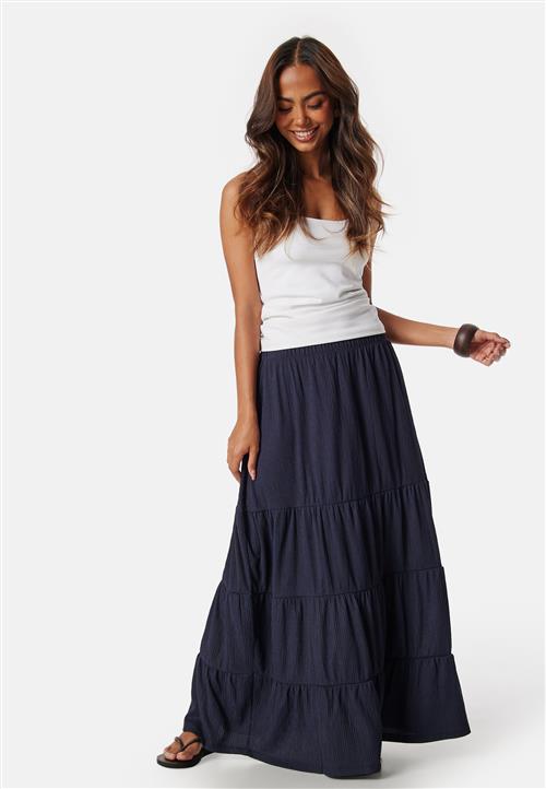 Se Happy Holly Flounce Maxi Skirt ved Bubbleroom
