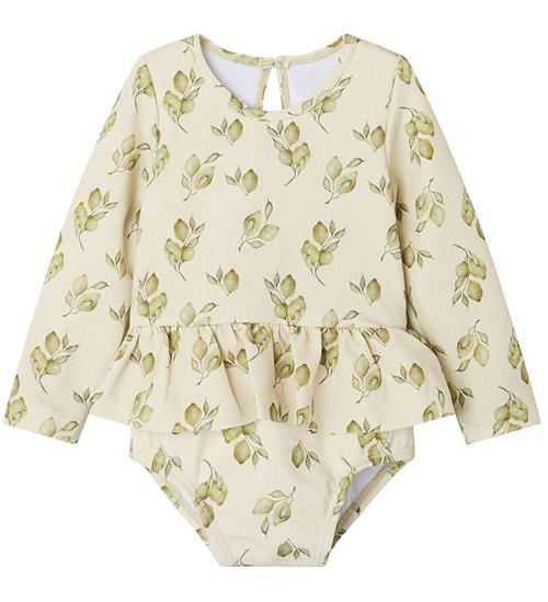 Se Lil' Atelier Badedragt - Vaflet - NbfFloria - Turtledove ved KidsWorld