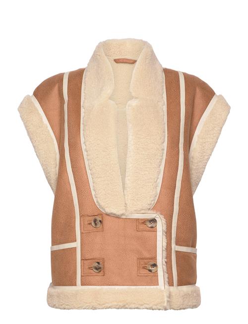 Fikaly Munthe Brown