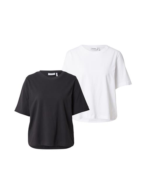 Se WEEKDAY Shirts  sort / hvid ved About You