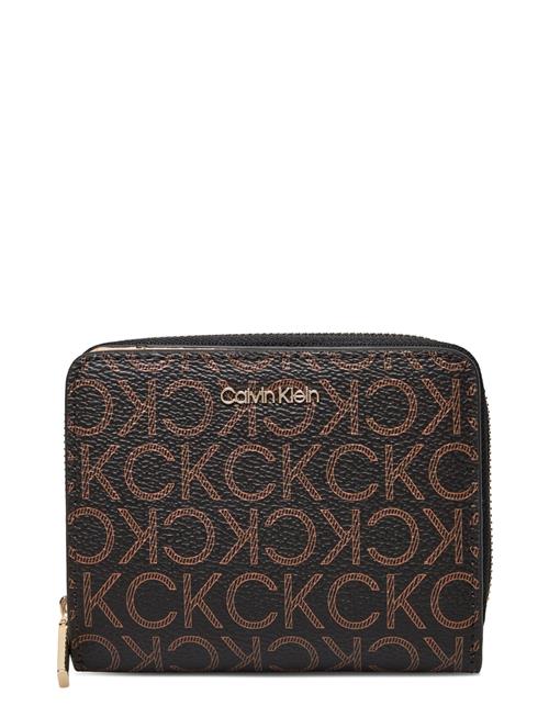 Ck Must Z/A Wllt W/Flap Md Mono Calvin Klein Patterned