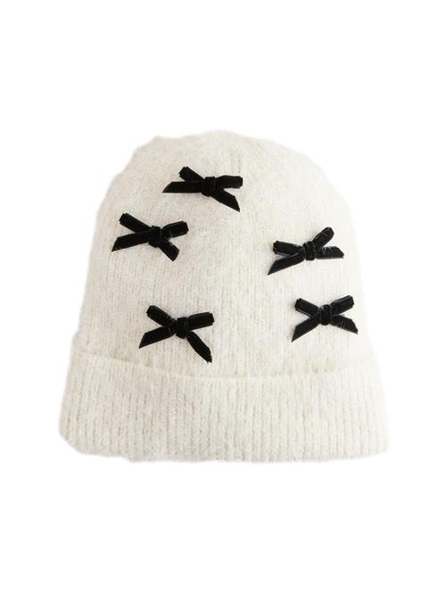 Next Hue  sort / hvid