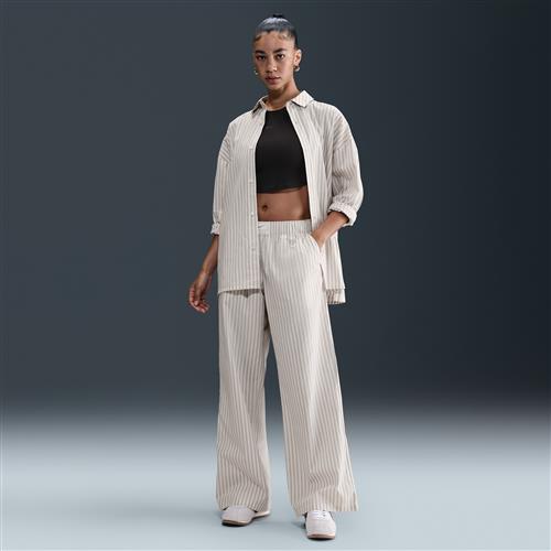 Løse Nike Chill Poplin-bukser med mellemhøj talje og striber til kvinder - grå