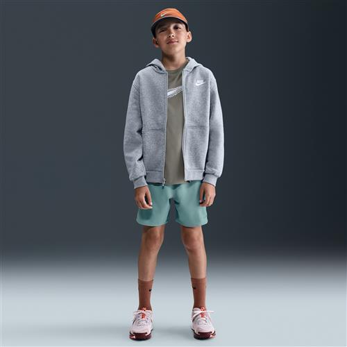 Nike Dri-FIT Challenger-løbeshorts til større børn (drenge) - grøn