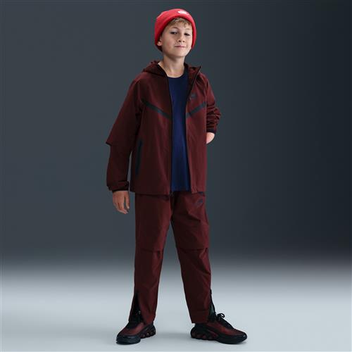 Vævede Nike Tech-bukser til større børn (drenge) - rød