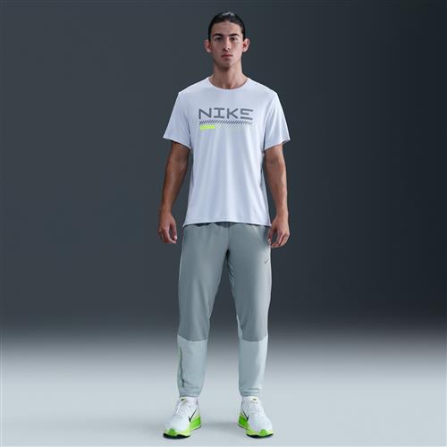 Nike Challenger Therma-FIT Winterized-løbebukser til mænd - grå