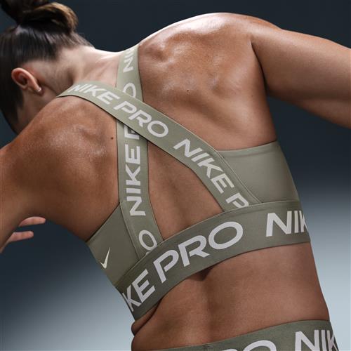 Nike Pro-sports-bh uden indlæg og med let støtte til kvinder - grøn