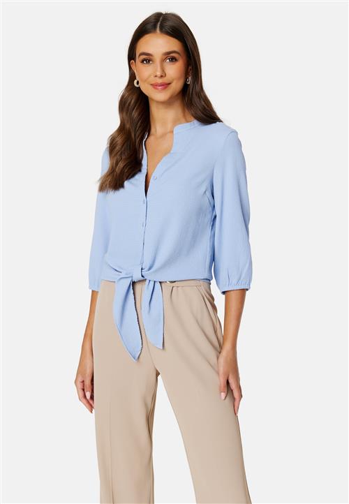 Happy Holly Linn ss knot blouse