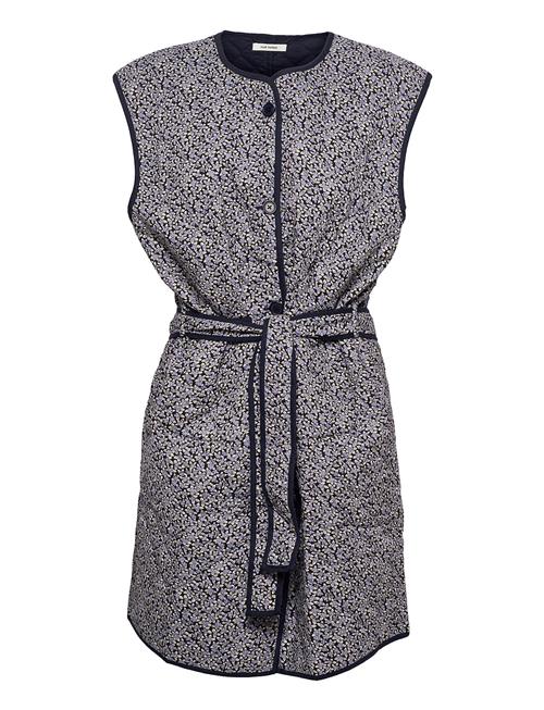 nué notes | Ozzie Vest | 34