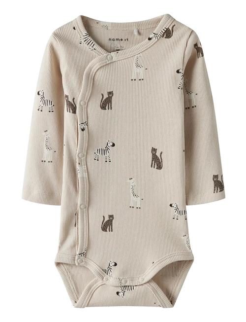 name it | Nbntolla Ls Wrap Body | 74