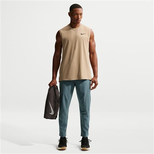 Alsidige Nike Unlimited-Dri-FIT-bukser med lynlåsmanchetter til mænd - grå