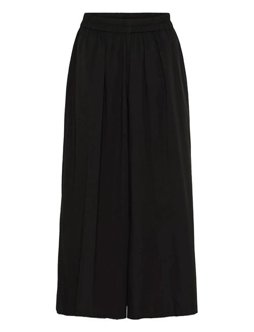 Soaked | Slnoelle Pants | L