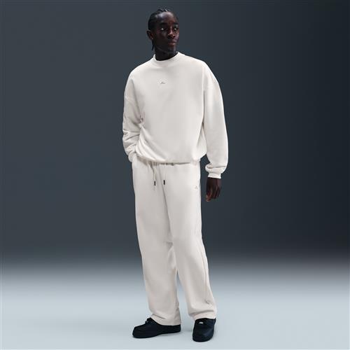 Nike Standard Issue Therma-FIT-basketballbukser med åbne manchetter til mænd - hvid