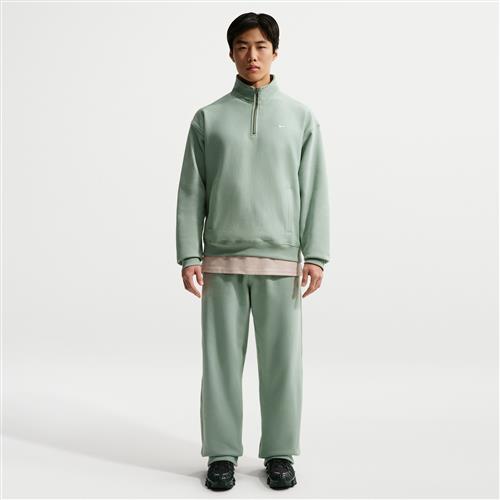 Nike Solo Swoosh-fleecebukser med åben kant til mænd - grøn