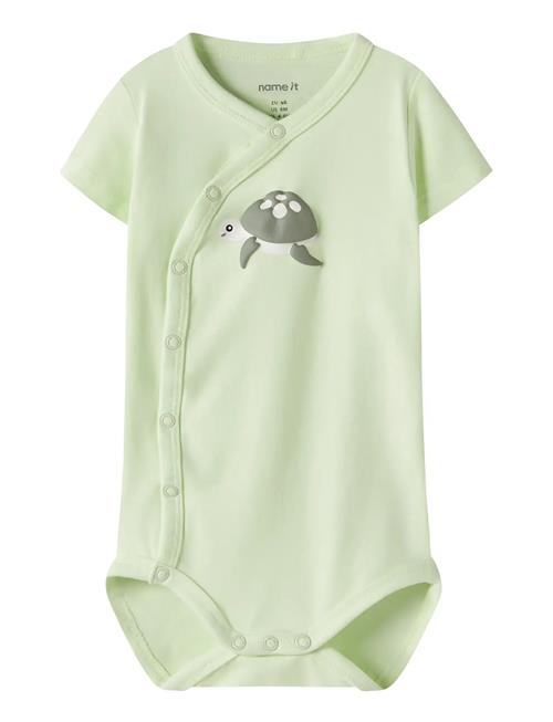 name it | Nbmvacion Ss Wrap Body | 62