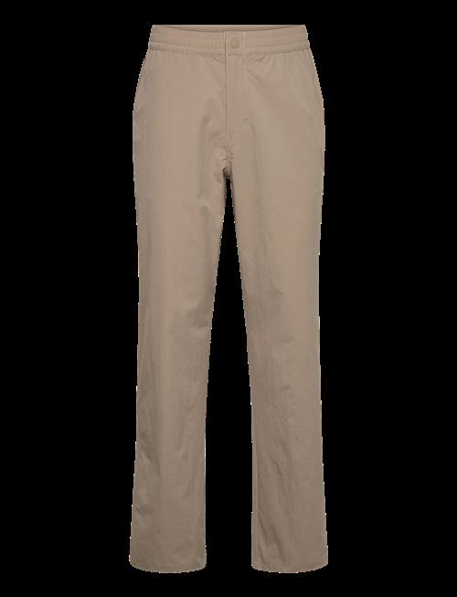 FILA | High Tide Relaxed 4-Way Stretch Trousers | XL